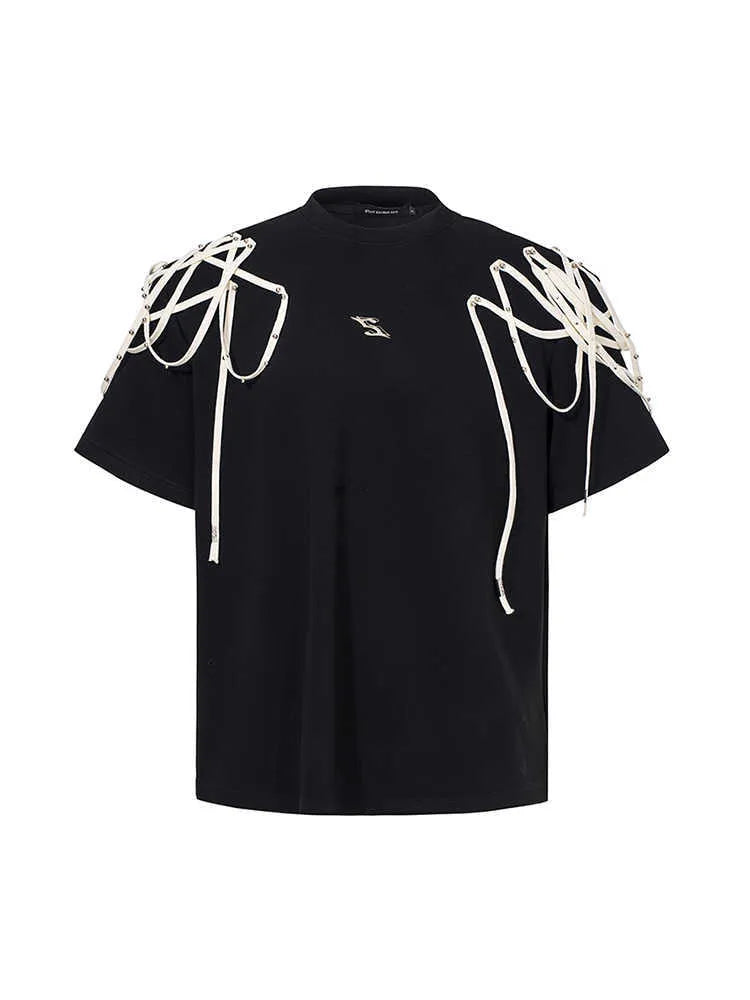 Black loose fit short-sleeved T-shirt with padded shoulders featuring rivet and ribbon detail.