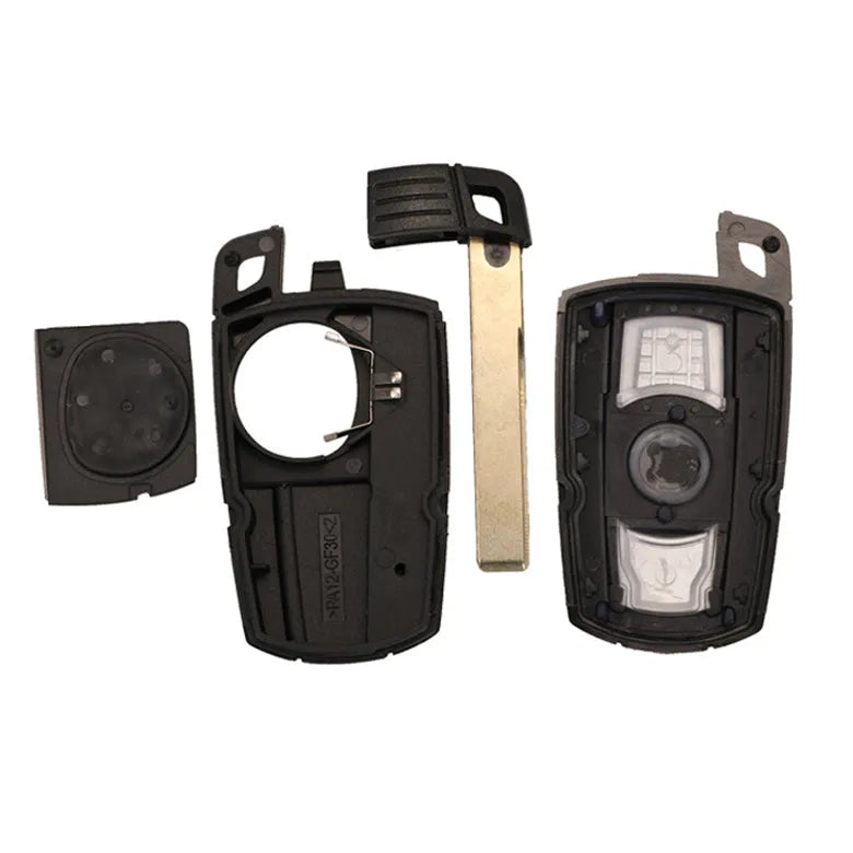 BMW semi-intelligent remote car key fob with three buttons, metal and plastic casing.