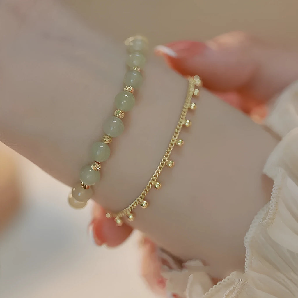 Natural Hetian Jade bracelet with princess running motif for women's daily wear.