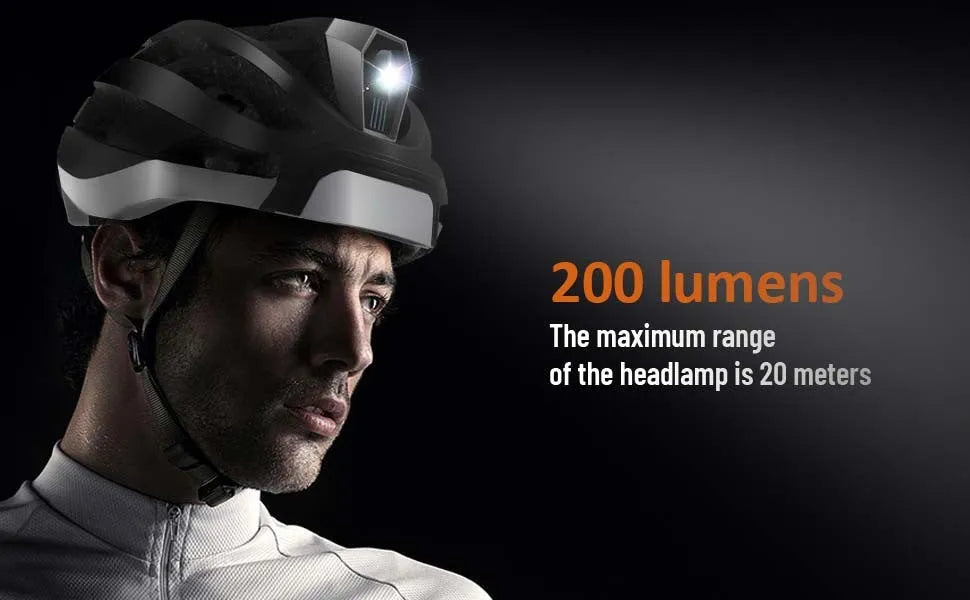Black and grey adult cycling smart helmet with integrated red LED safety light on the rear.