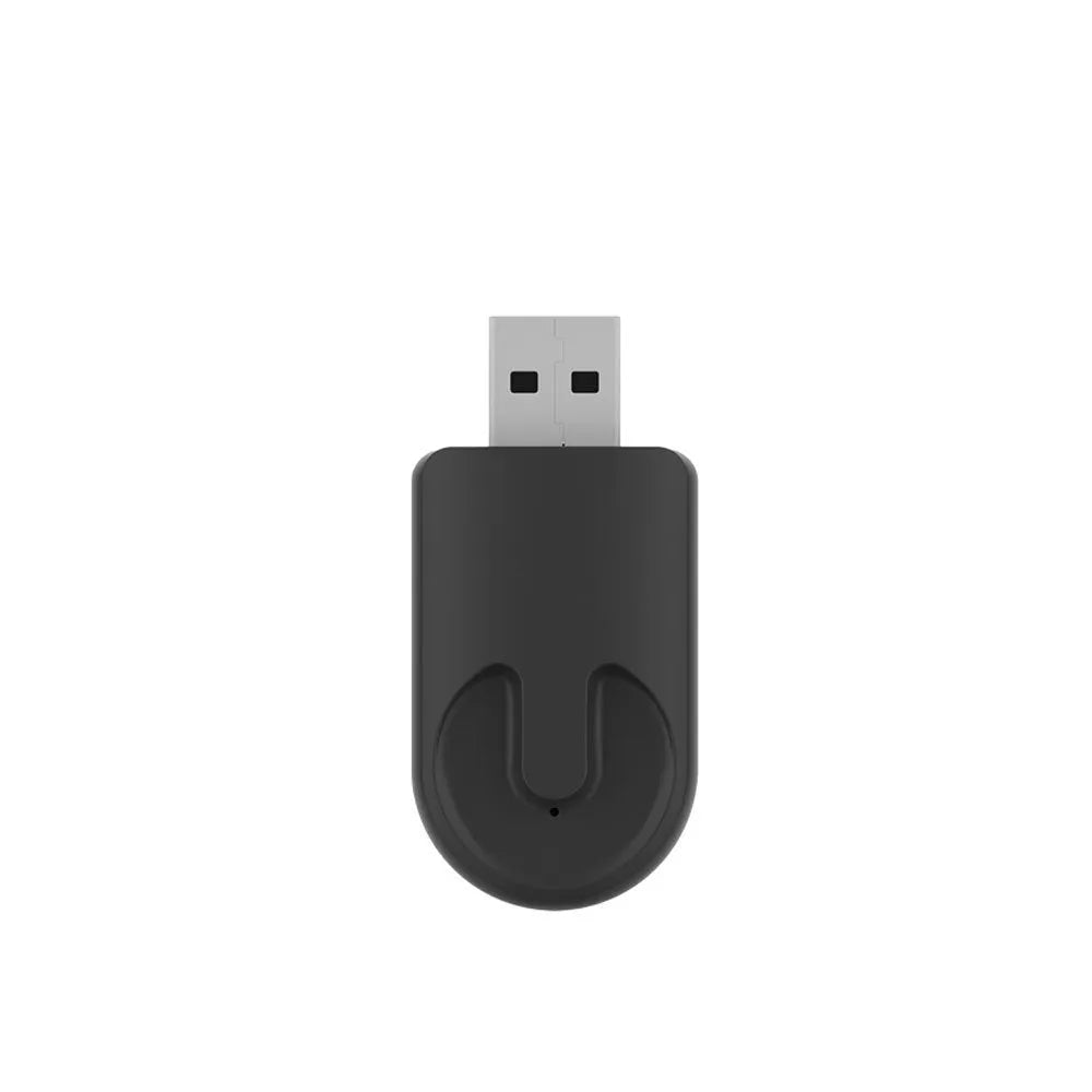 Mini black CarPlay USB wireless data adapter with compact rectangular design