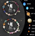 Two natural stone beaded bracelets on a wrist showing zodiac symbols, with an elastic cord.