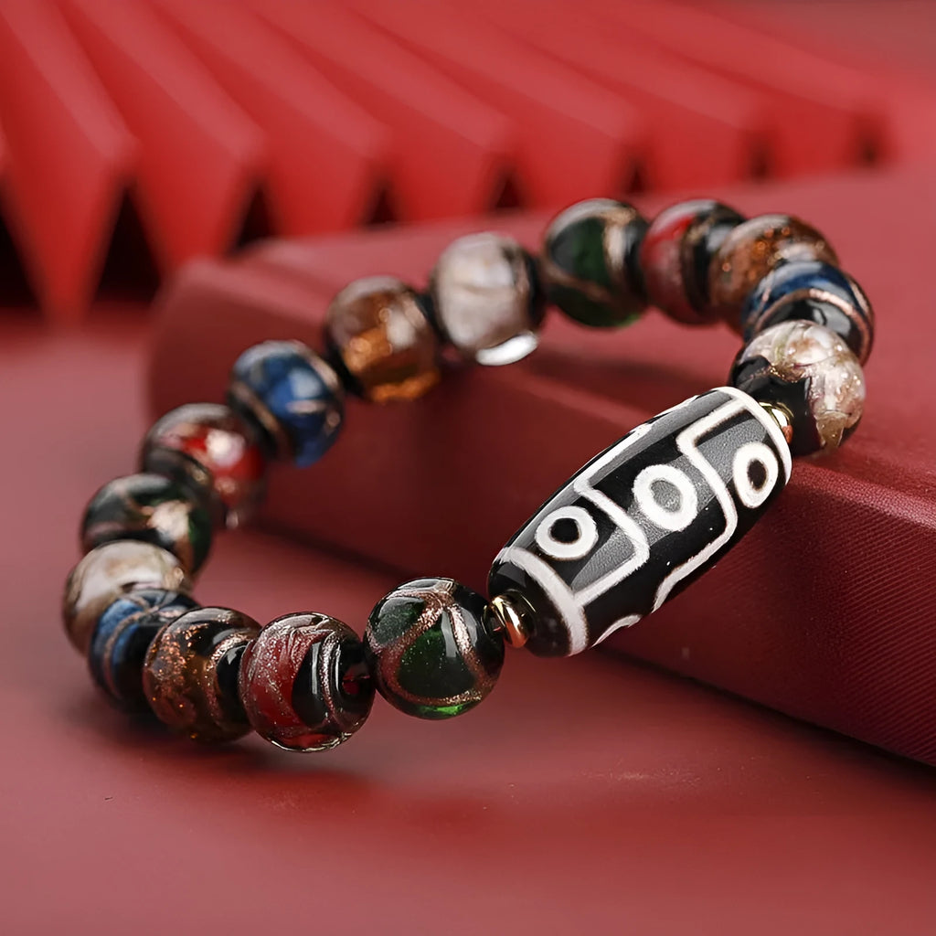 Chinese-style five-colour glaze bracelet with snake motifs and manual beadwork.