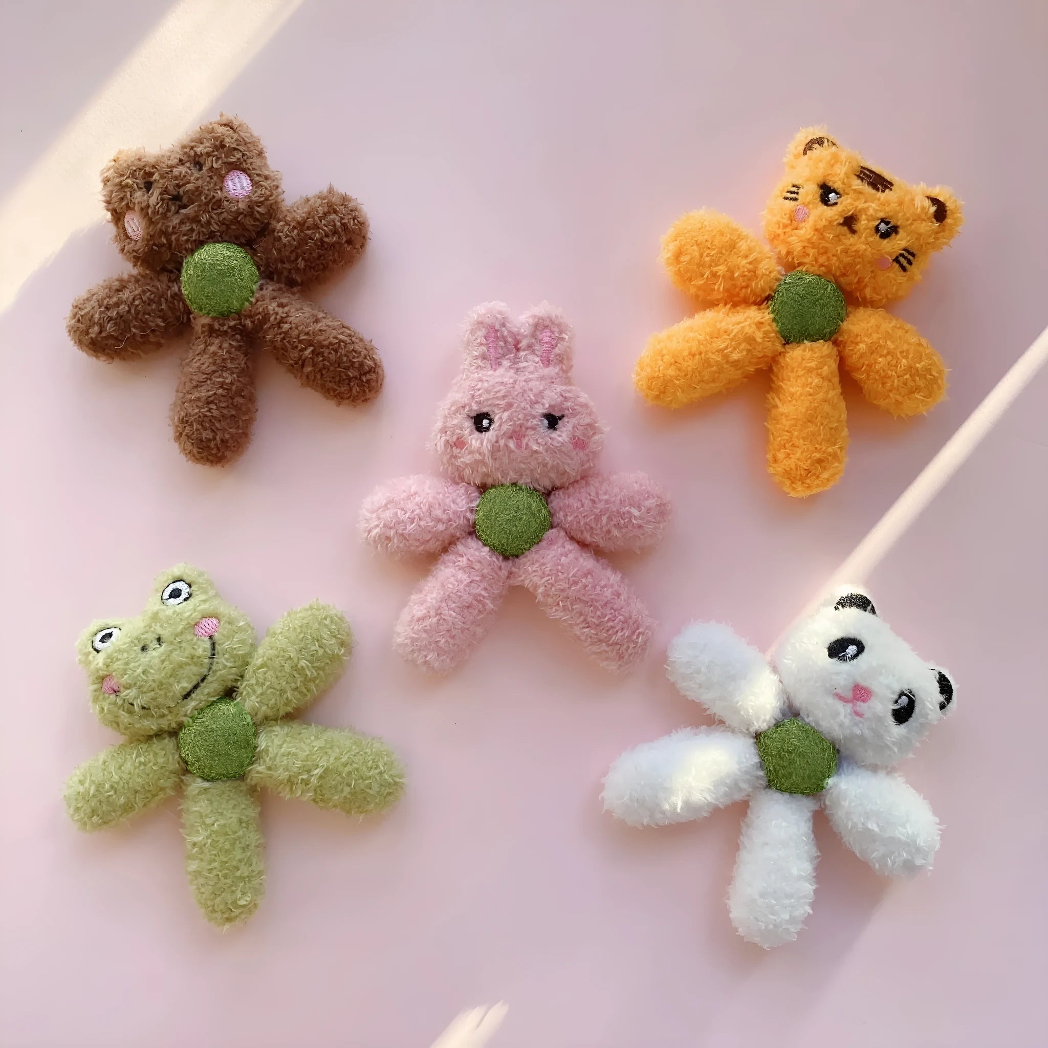 Catnip ball chewing toy in animal designs for feline dental play and entertainment