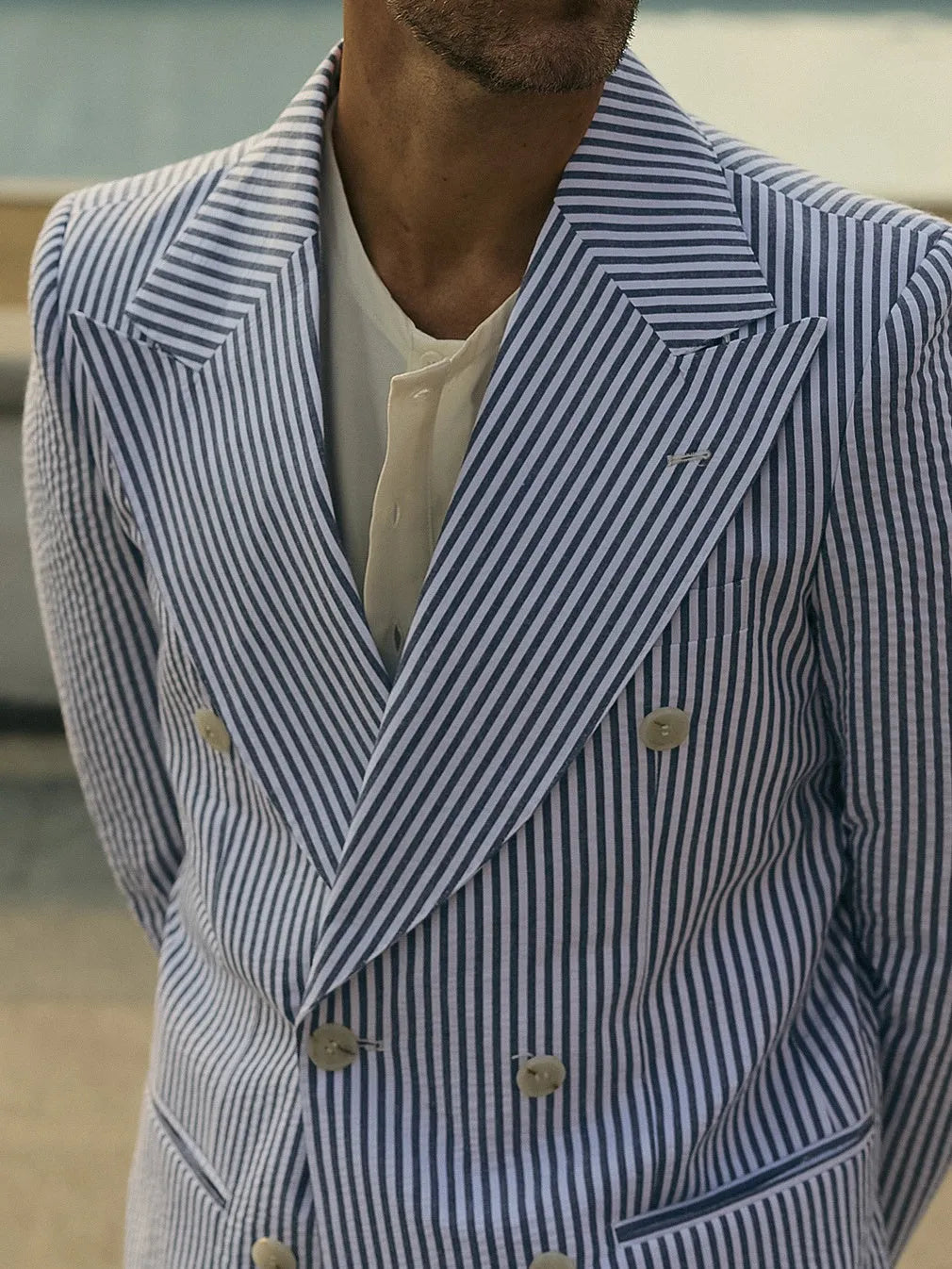 Blue and white striped men's polyester suit set with blazer and trousers