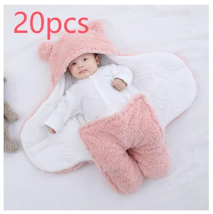 Baby quilted sleeping bag wrapper in cotton blend fabric, shown in a light blue colour.