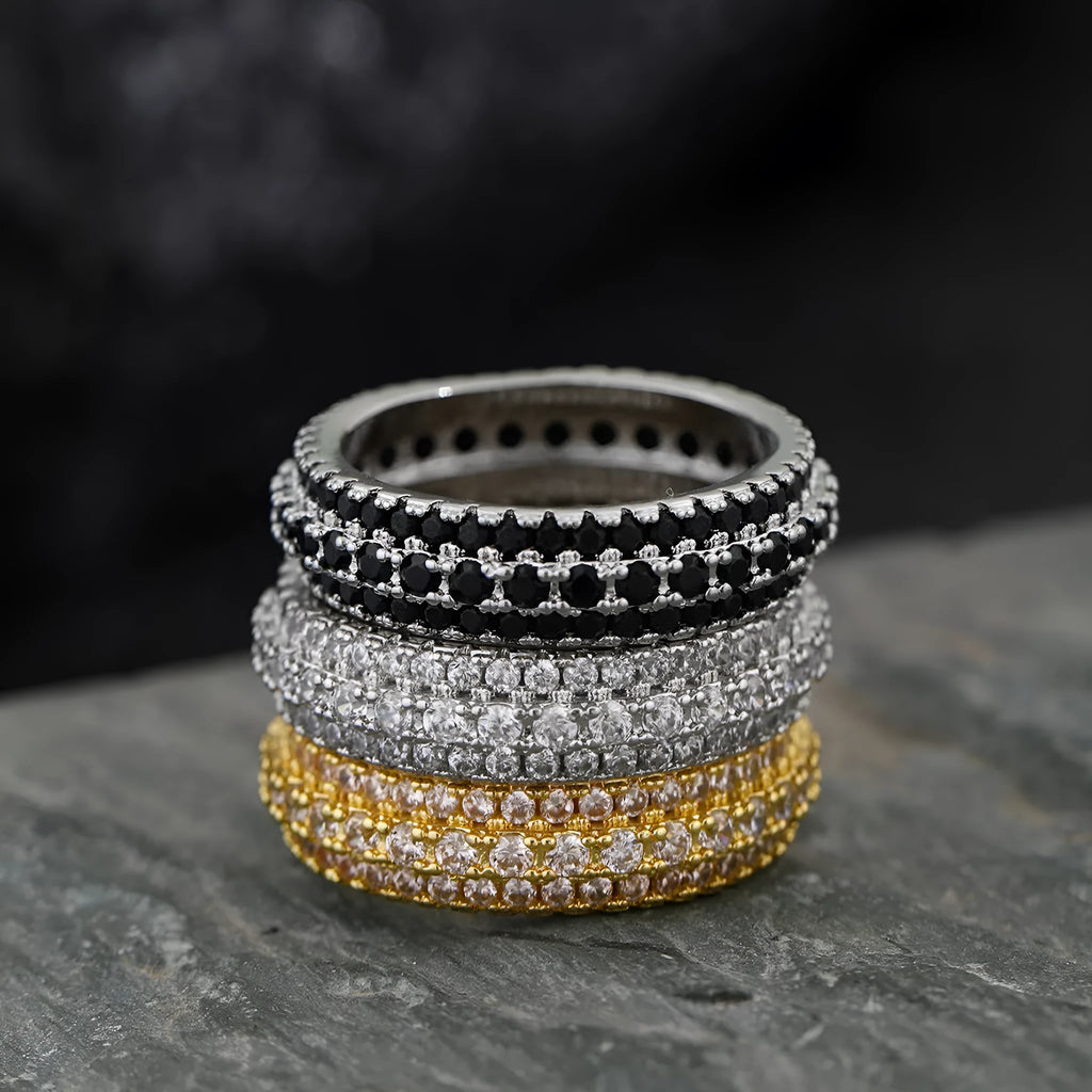 Geometric personalised ring with triangular design and zircon stone, shown in a gold colour finish.