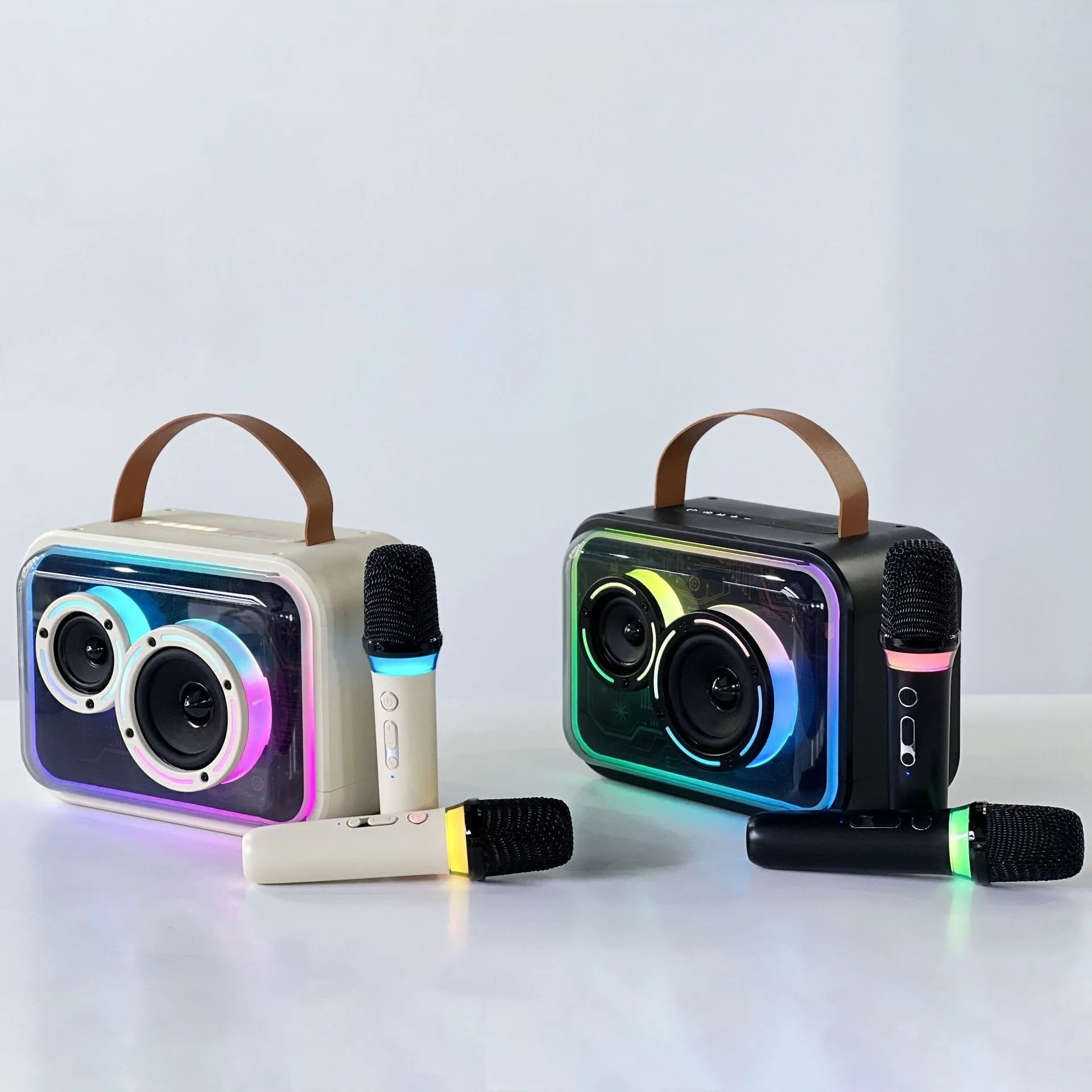 Light yellow portable Bluetooth speaker with RGB lighting and a wireless microphone on a table