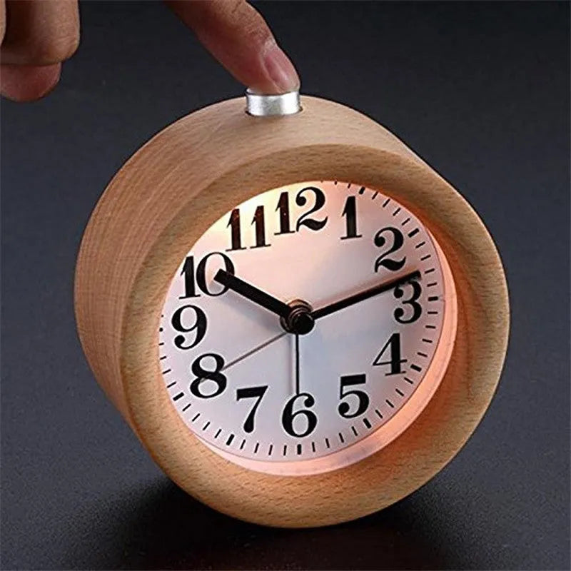 Solid beech wood alarm clock with white dial showing 4-inch diameter and wooden case