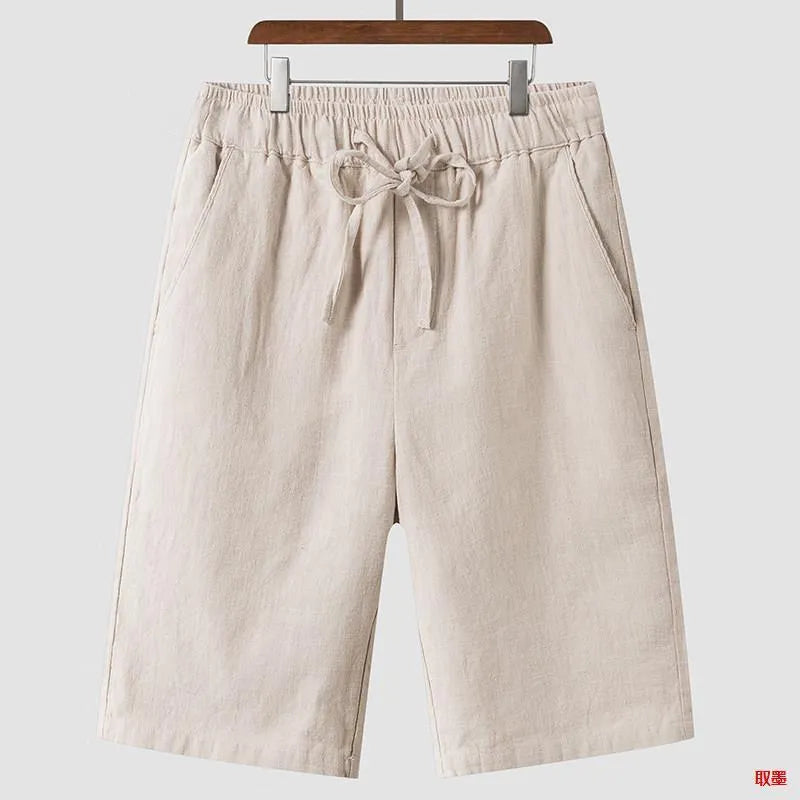 Men's linen shorts in loose cropped style with elastic waistband in various colours