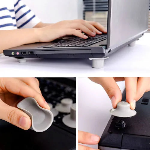 Four grey durable plastic laptop cooling pads, two large and two small, placed on a desk surface.