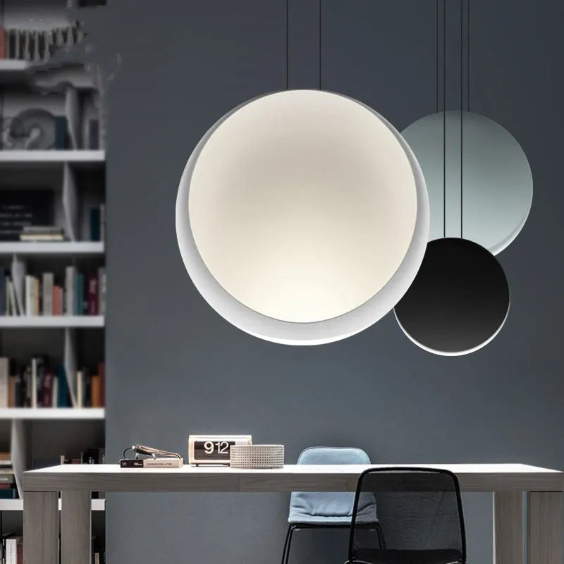 Round crystal-style resin ceiling chandelier with adjustable height, shown illuminated.