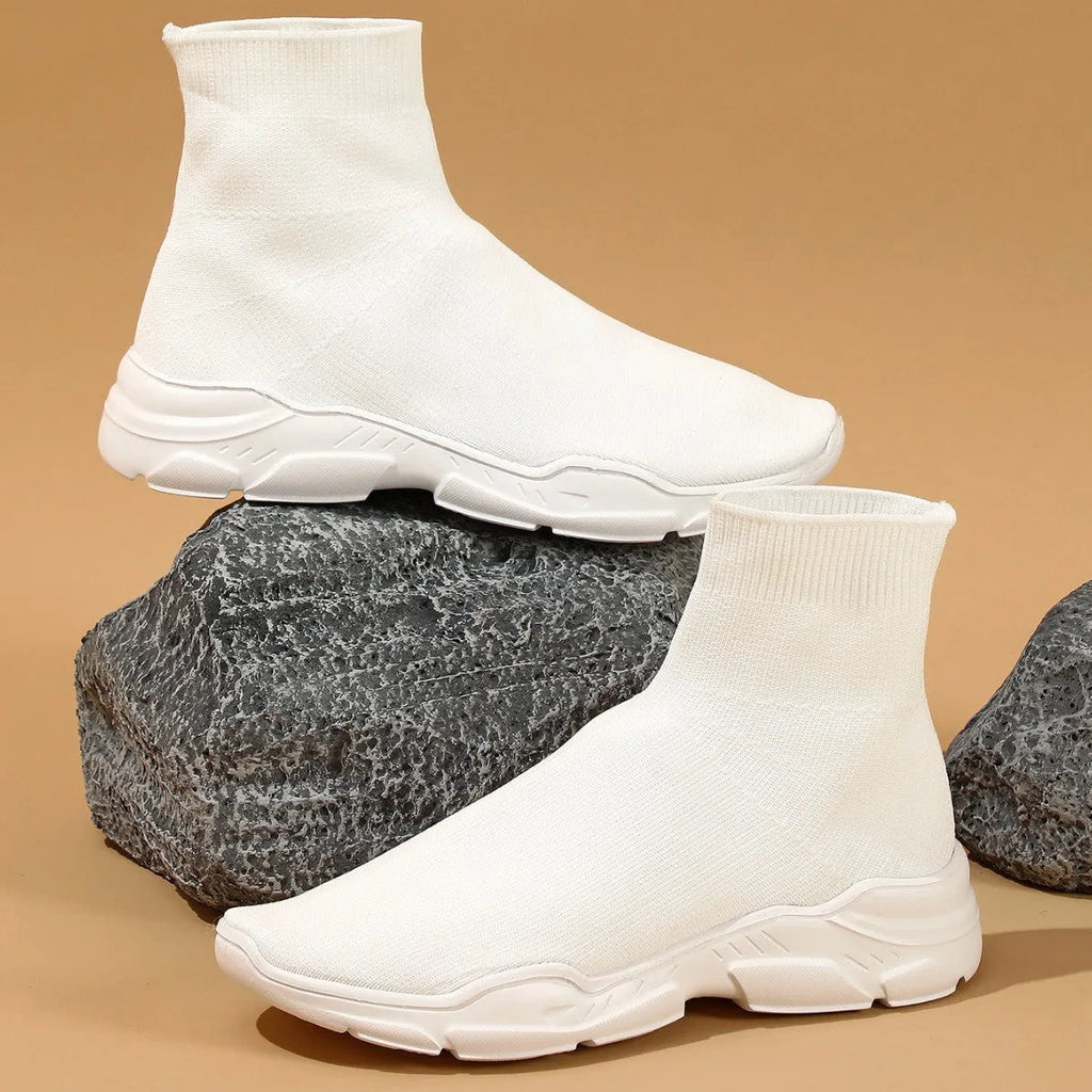 Thick-soled slip-on casual shoes in black with fabric upper and round toe