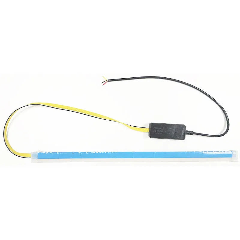 Flexible silicone car LED light strip for daytime running and flowing turn signals, showing wire connections.