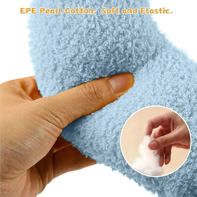 White U-shaped plush pet pillow for a small cat or dog on a grey background.