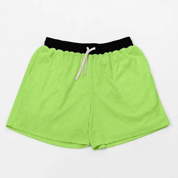 Men's solid colour quick-drying mesh sports shorts in black, shown for running.