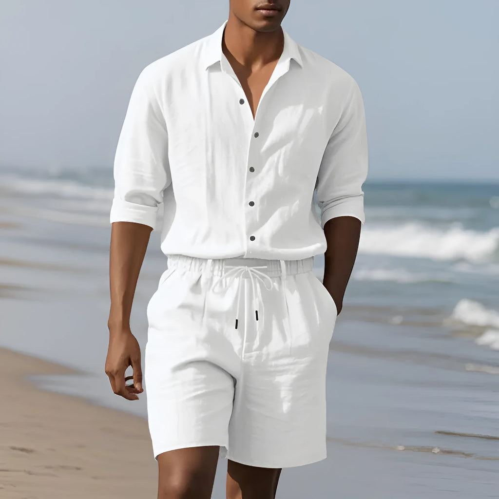 Men's linen beach suit showing long sleeve shirt and matching shorts in light blue colour