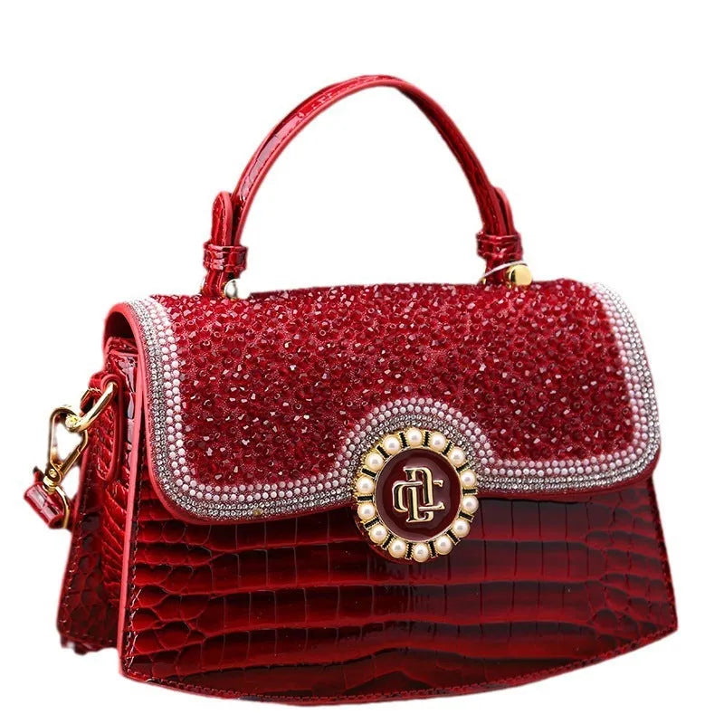 Patent PU diamond shoulder bag in black with oval shape and lock detail, urban simplicity style