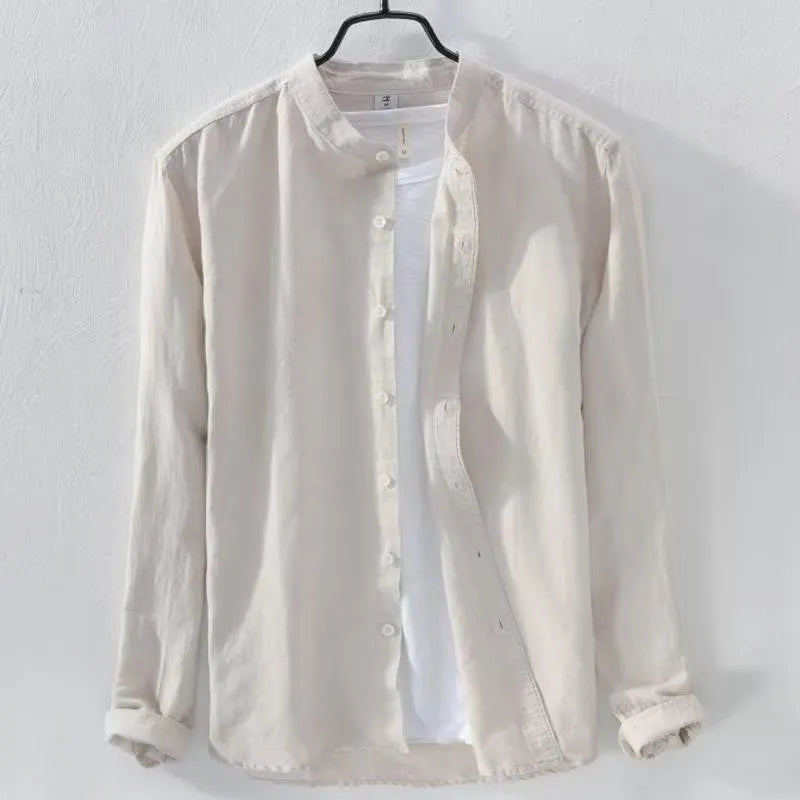 A man's loose-fitting, long-sleeve casual shirt in a cotton linen blend, shown in a solid colour.
