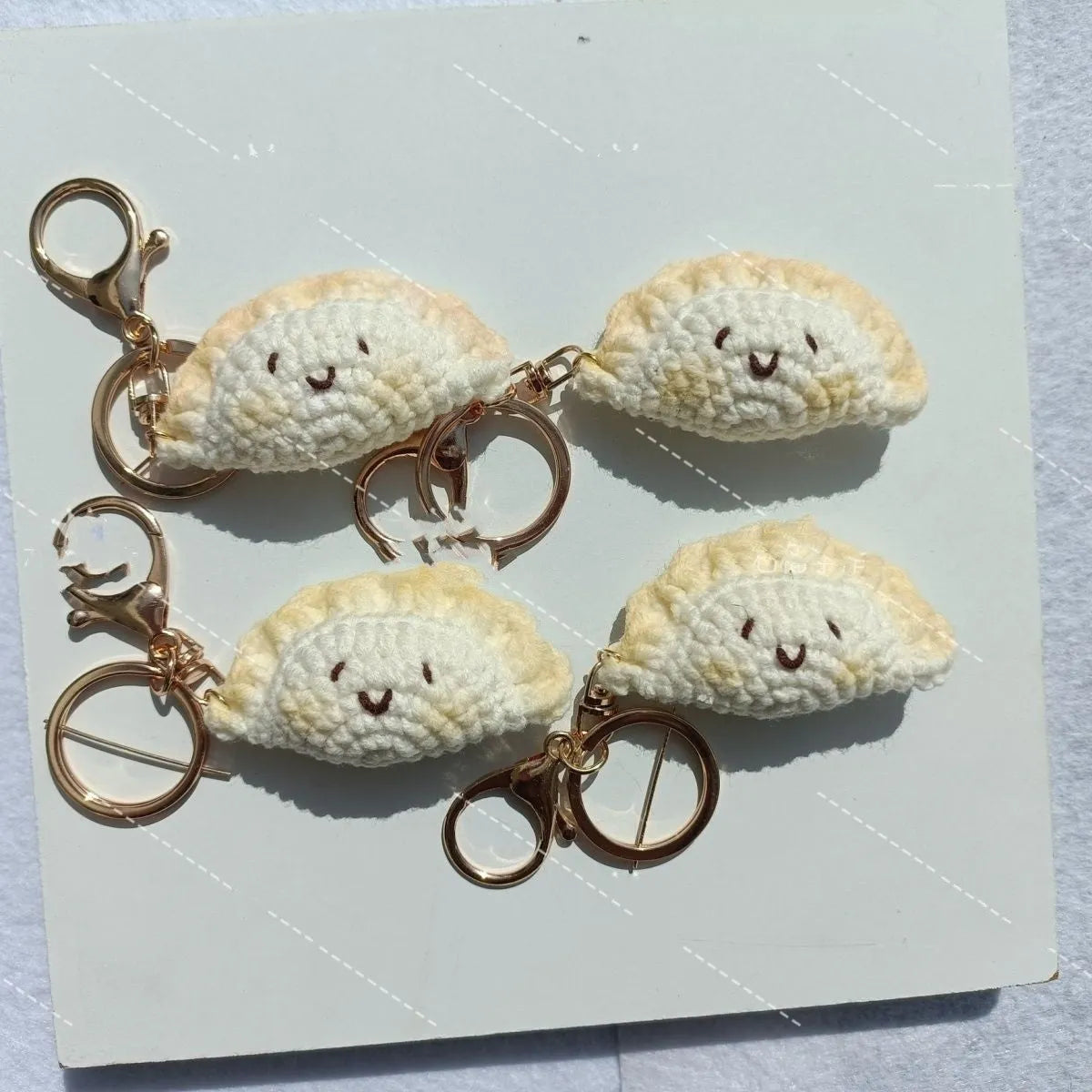 Handmade crochet plush dumpling pendant with keychain and hand-stitched eyes