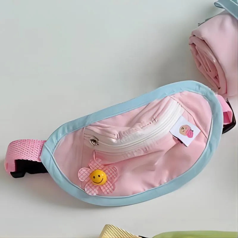 Pink and yellow messenger-style pet backpack for dogs and cats with poop bag feature