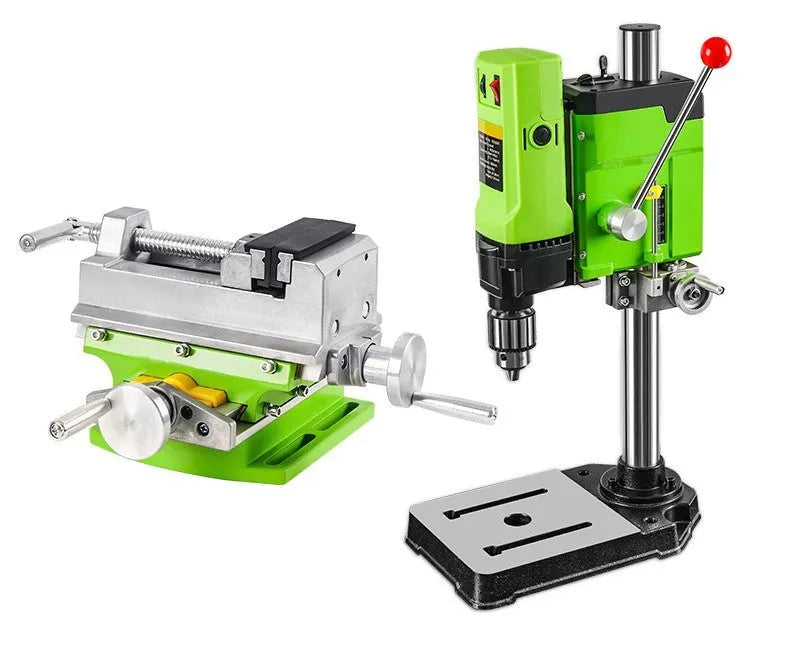 Mini bench drill and milling machine with heavy duty bench pliers on a workbench.