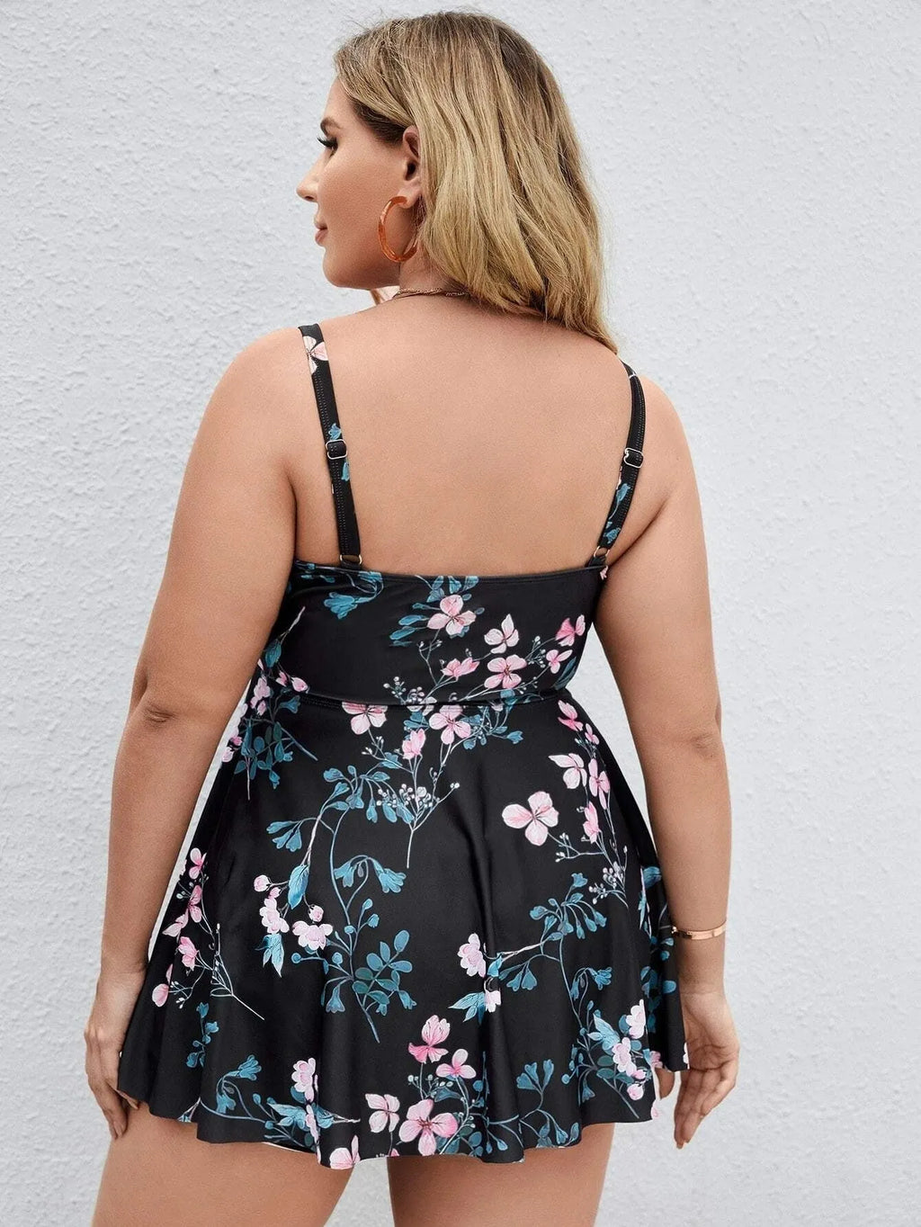 Women's floral print one-piece swimsuit with split colour design on high elasticity fabric.