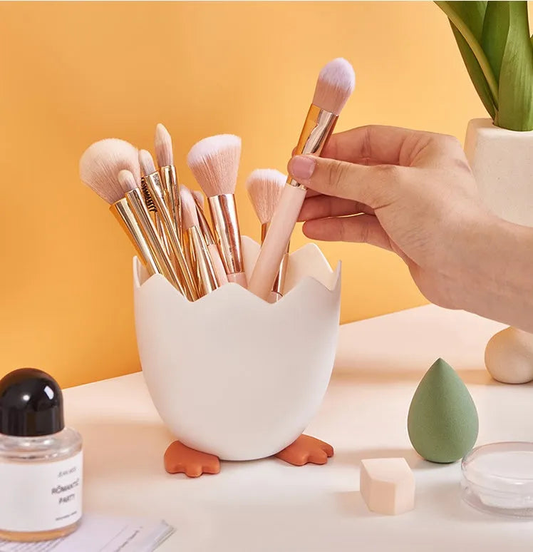 Plastic pen holder in cracked chicken cartoon style for desktop storage