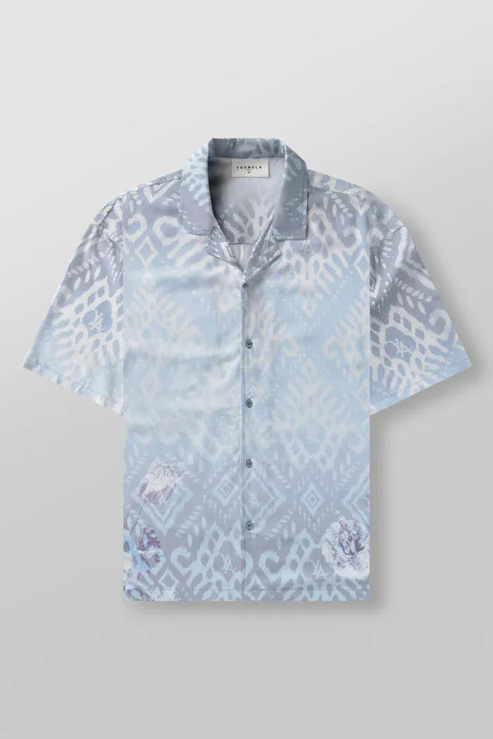 Men's loose-fit short sleeve top with floral print in light colour, laid flat.