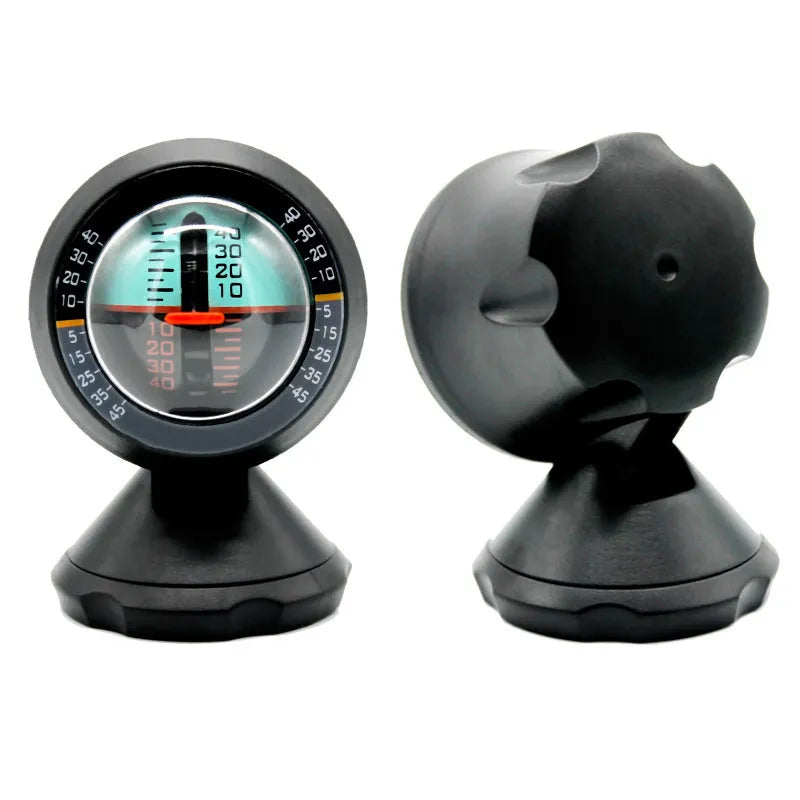 Black vehicle mounted slope meter for measuring inclination and rotation angles on dashboard.