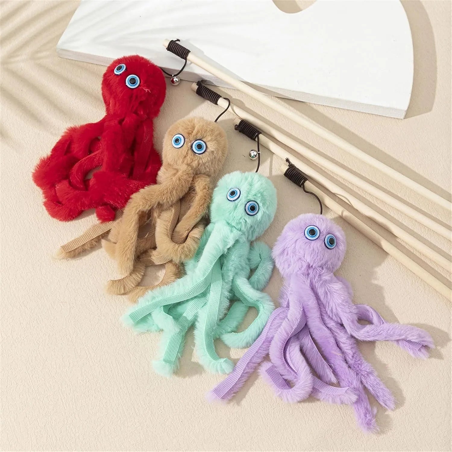 Octopus-themed cat toy with long stick handle in grey, pink, purple, or red colour options
