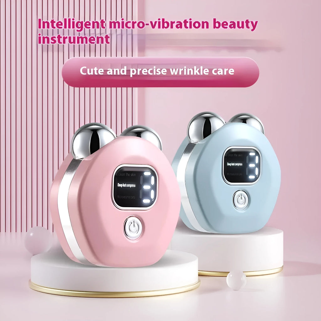 White portable facial massage instrument with double-roller head and USB cable on a blue background.
