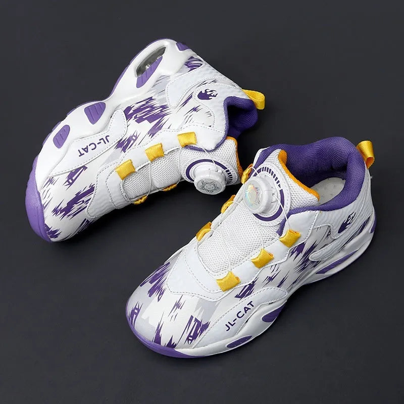 Children's black running shoes with a rotating button closure and cushion basketball design on a white background.