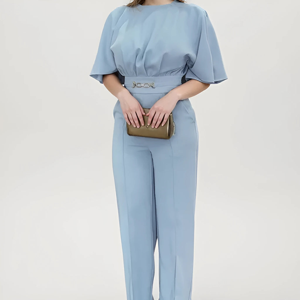 Blue men's casual suit with long sleeves and trousers on a hanger