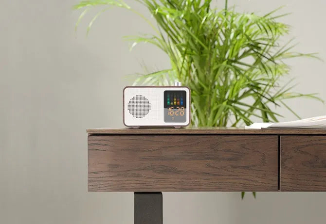 Brown wooden retro Bluetooth speaker with FM radio, LED display, and classic cabinet design.