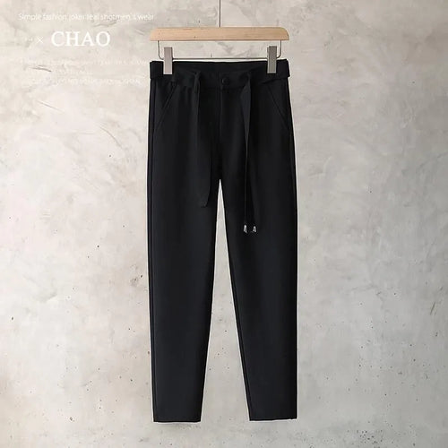 Boys slim straight wool trousers with tapered fit and belt loops in business casual styling