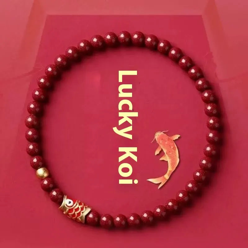 Handmade natural cinnabar koi bracelet with golden ball in national style