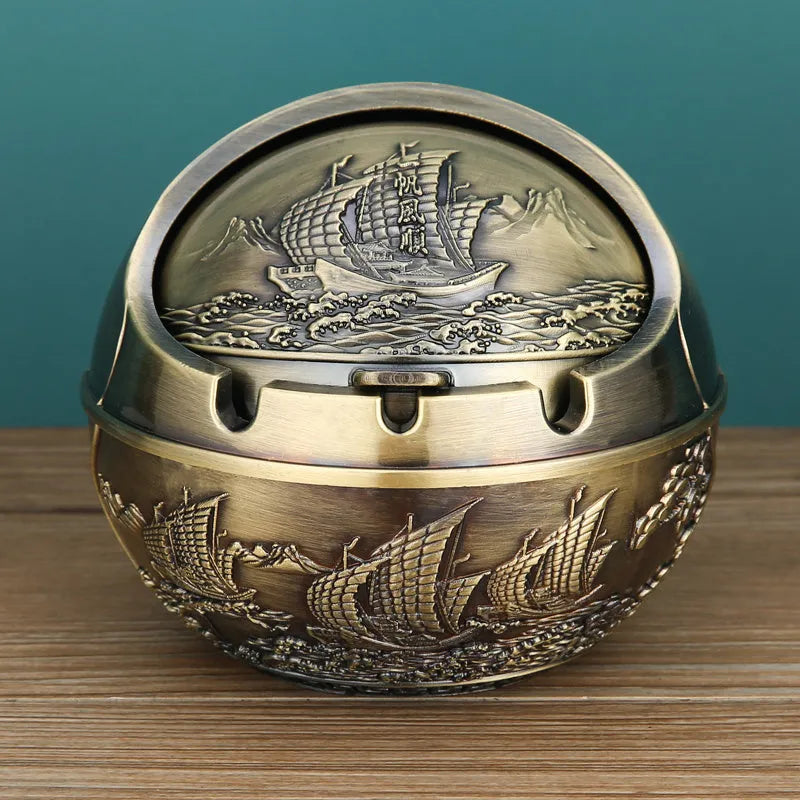 Bronze alloy ashtray with decorative fortune tree design and smoke extinguishing slot.