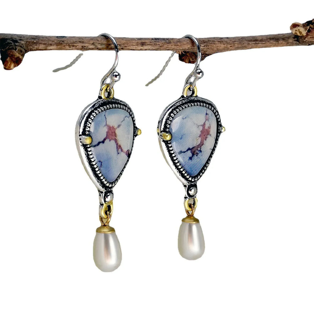 Retro blue geometric drop earrings with electroplated metal, synthetic opal and pearl details