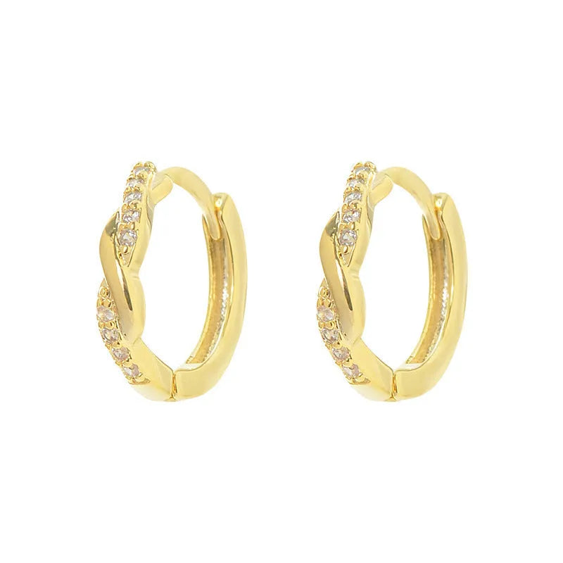 Women's gold geometric clip-on earrings with an interwoven hemp rope design.