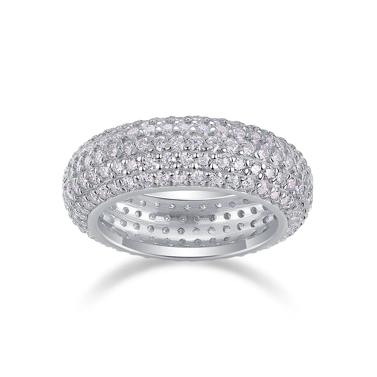 Moissanite wedding ring with S925 silver platinum plated band on flat surface showing stone and certificate