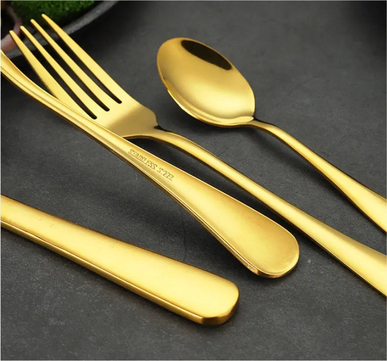24-piece stainless steel cutlery set in a choice of colours including black, gold, and rose gold.