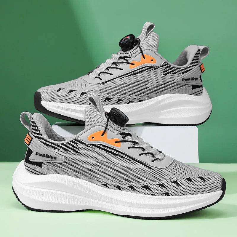 Men's white and green casual running shoes with fly-kit mesh, rotating buckle, and flat TPU sole.