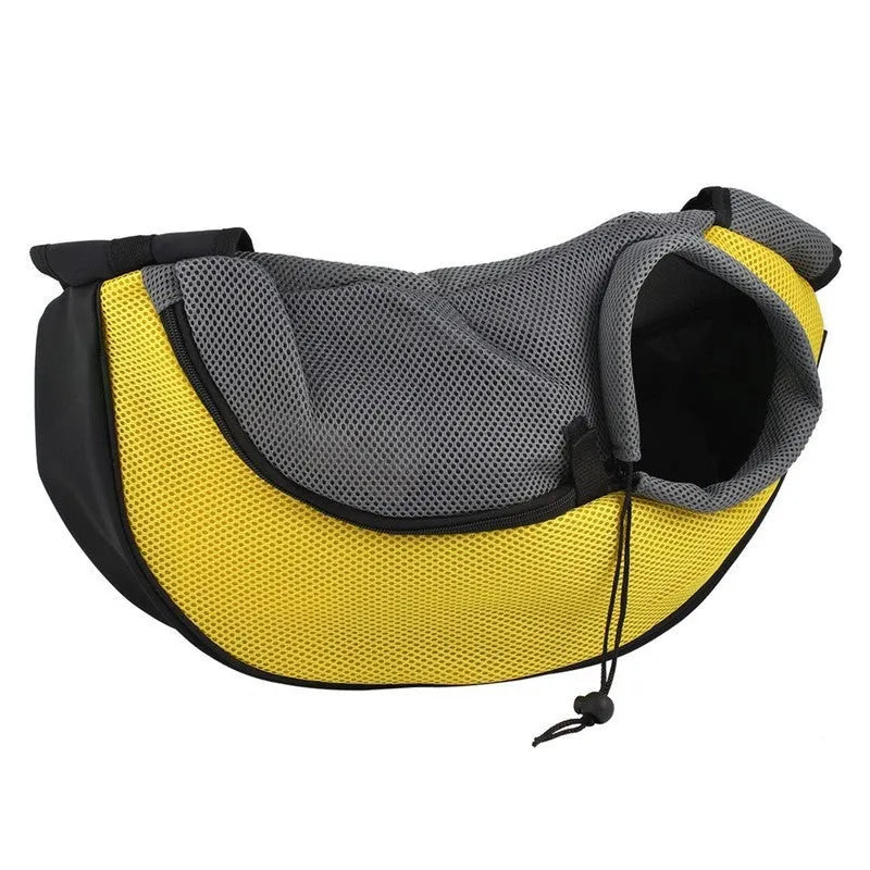Blue pet carrier backpack for a small dog, showing padded interior and shoulder straps.