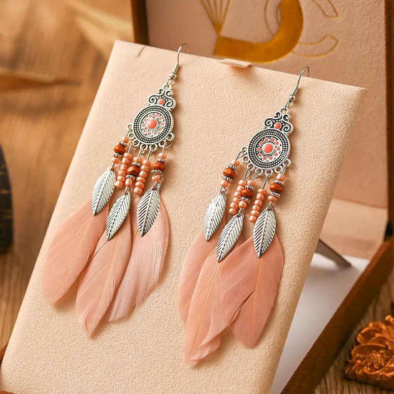 Handmade feather pattern bohemian earrings in multiple colours with leaf design detail