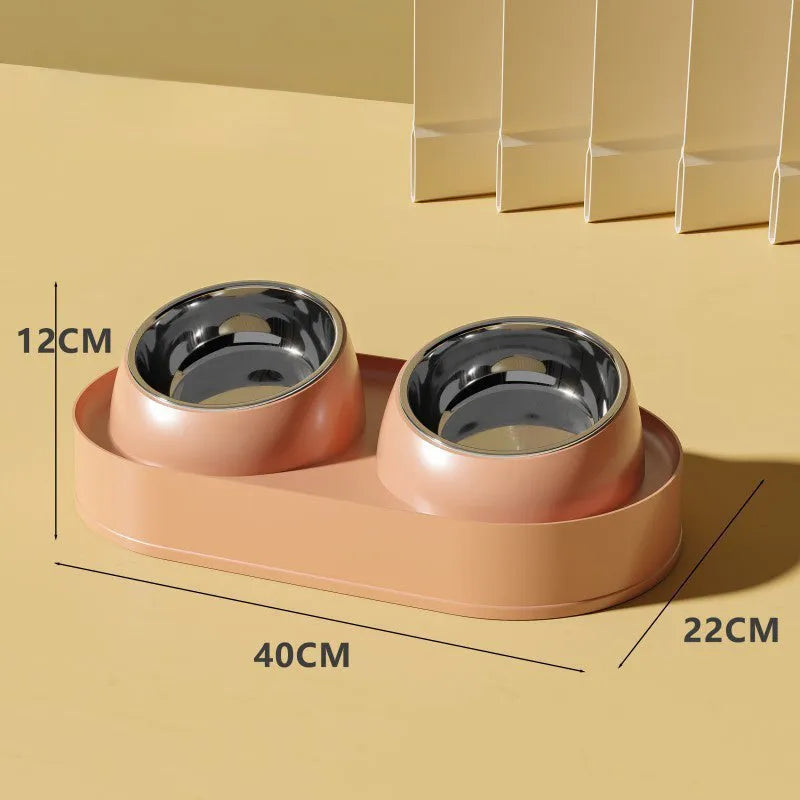 White elevated pet feeder with two tilted bowls on a wide base, for cats and small dogs.