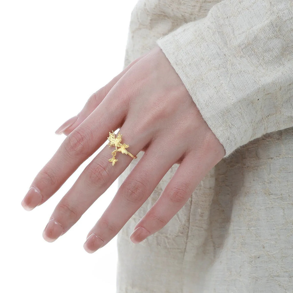 Adjustable silver butterfly ring with electroplated finish in white gold or 18K gold colour option