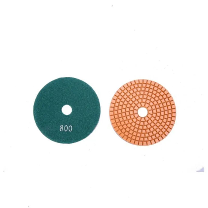 Set of 10 stone polishing pads with emery abrasive, showing 80mm diameter and central 10mm hole.