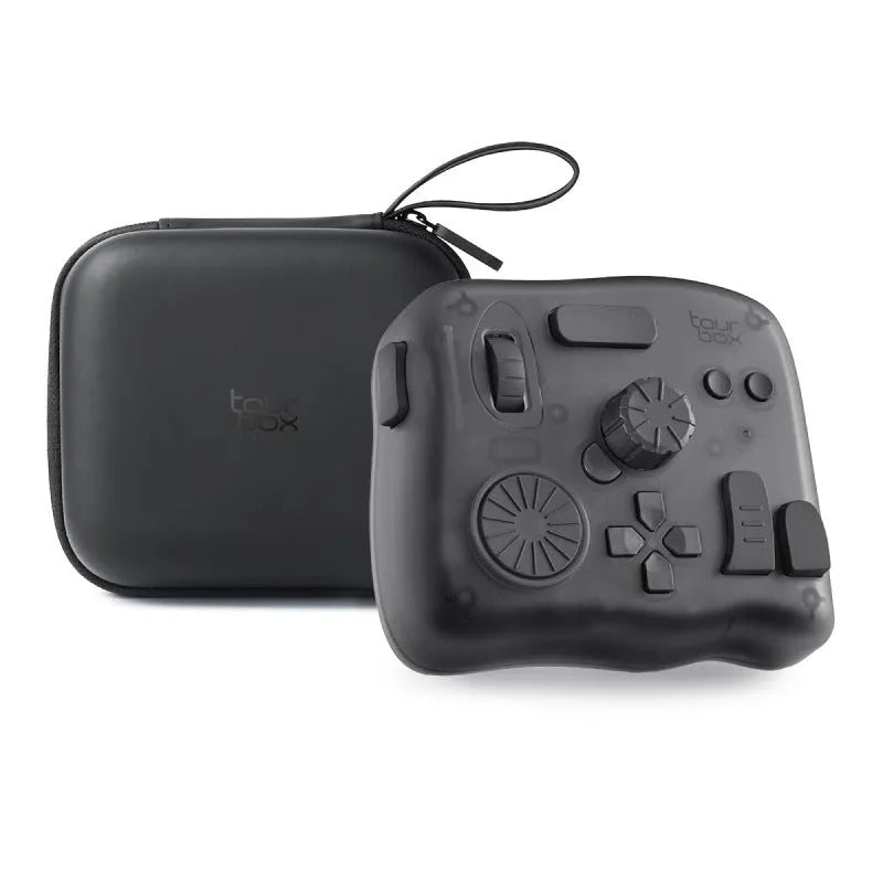 TourBox NEO black video editing controller with dials and buttons on a desk.