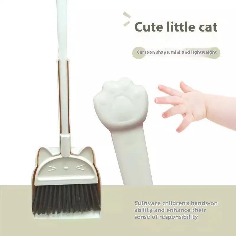Purple plastic broom and dustpan set with a rotating brush holder on a wooden floor.